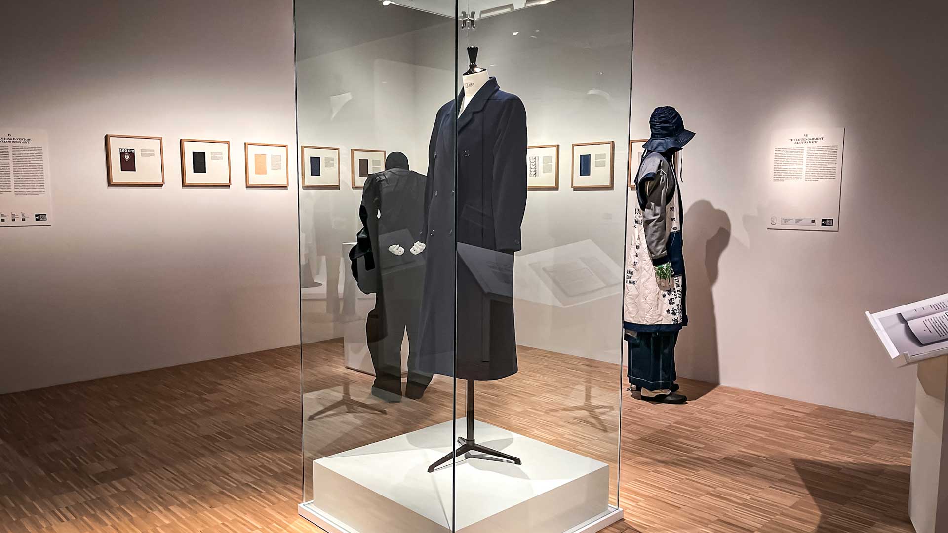 a display case with mannequins in it in a museum